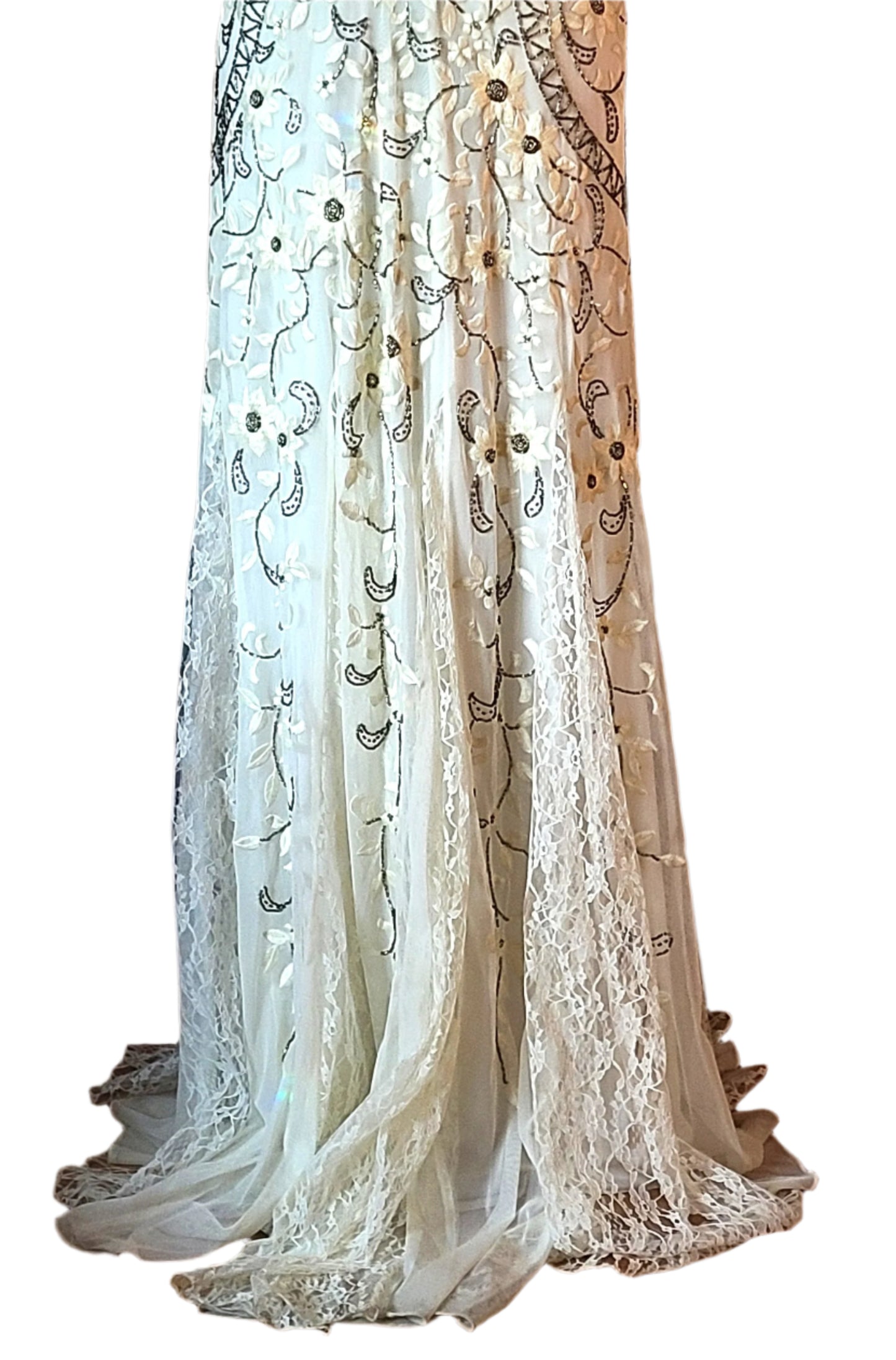 Lace dress with intricate patterns on a chair.