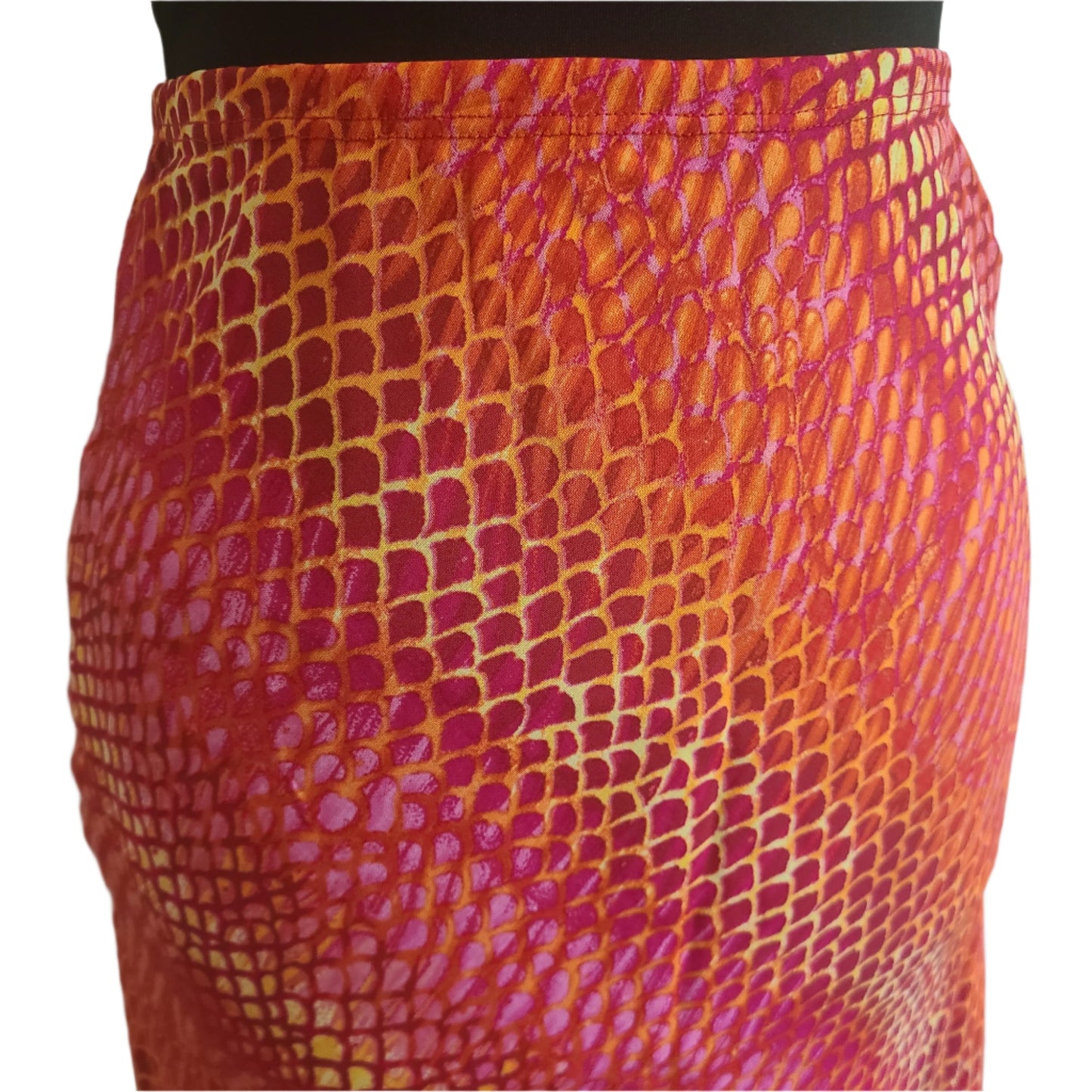 Rayon fabric with orange, yellow, pink fish scale pattern