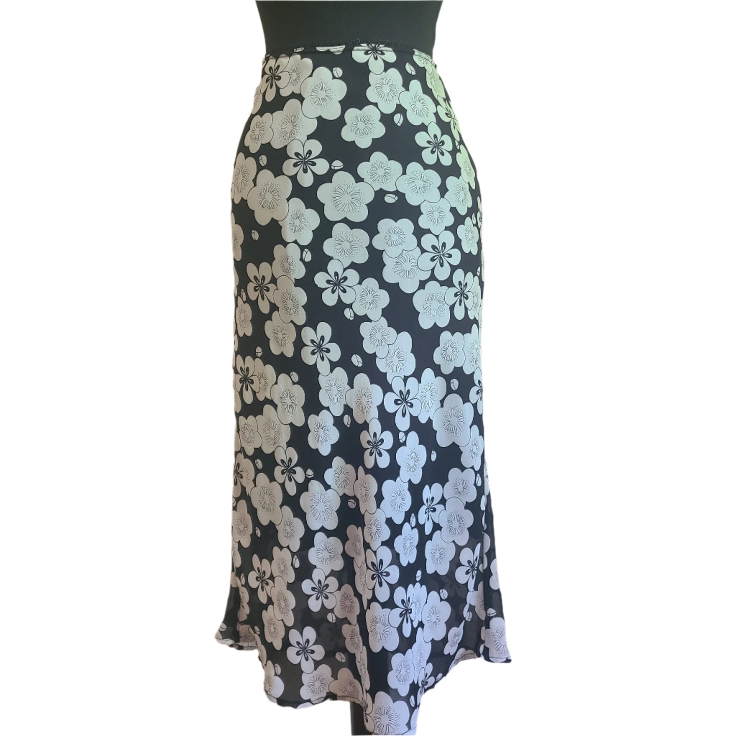 Y2K skirt white retro flower pattern on a black background