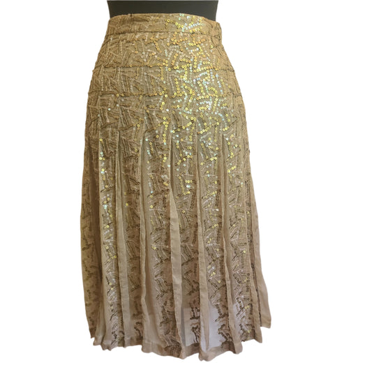 Gold sequin designer skirt on a sheer fabric