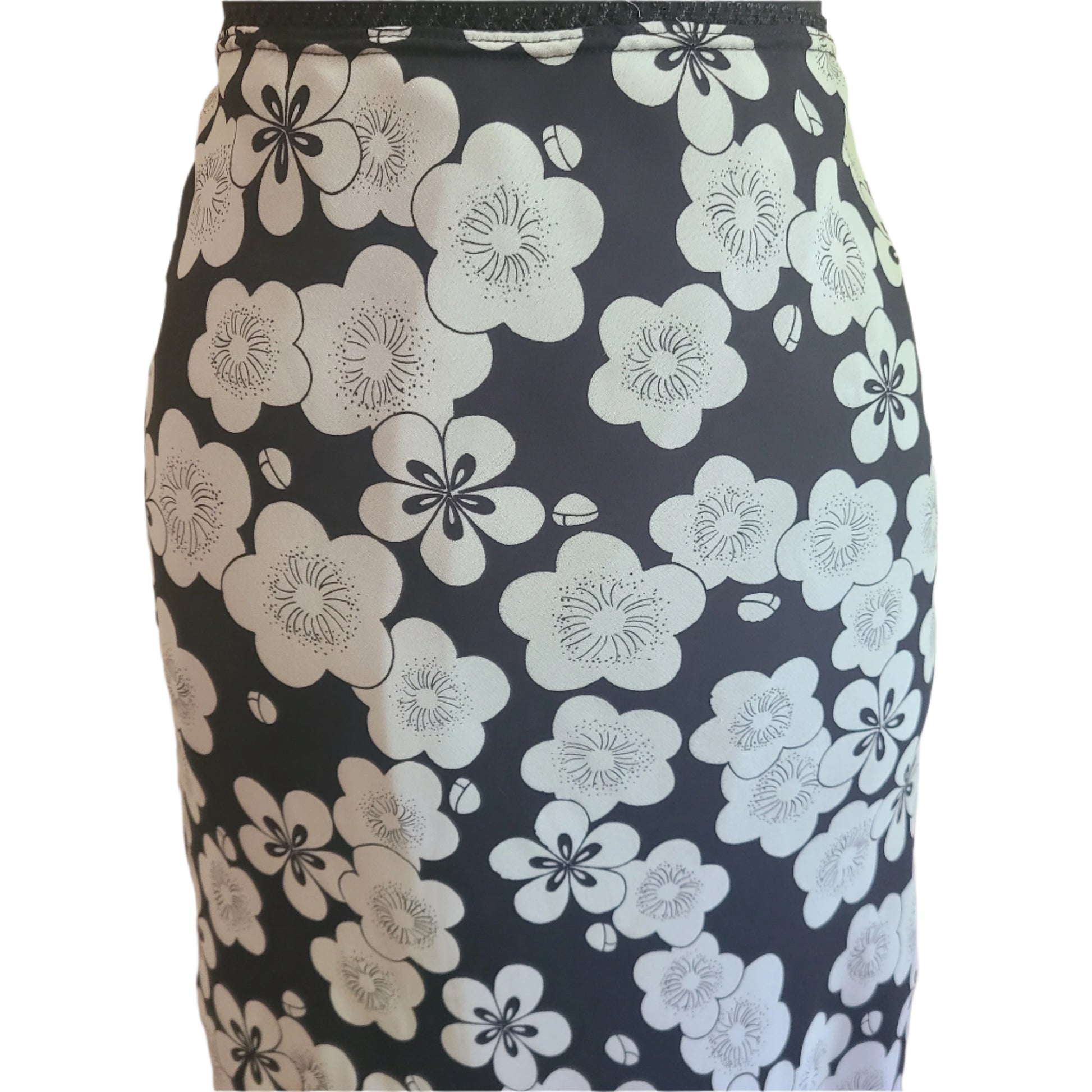 Retro white floral patterned skirt on a black background